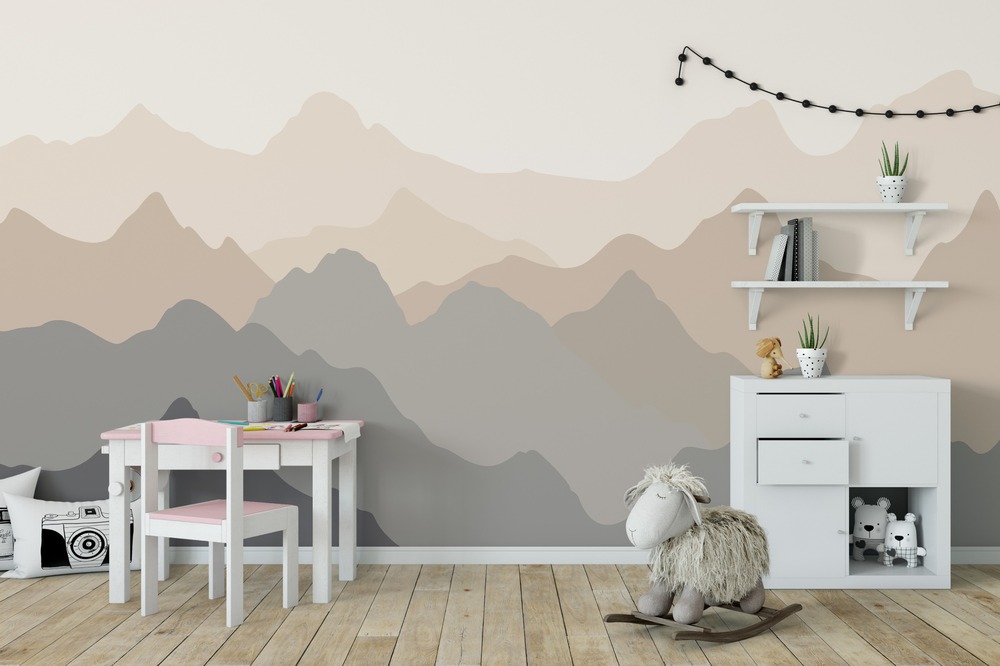 habiatcion infantil con motivos de montañas en pared